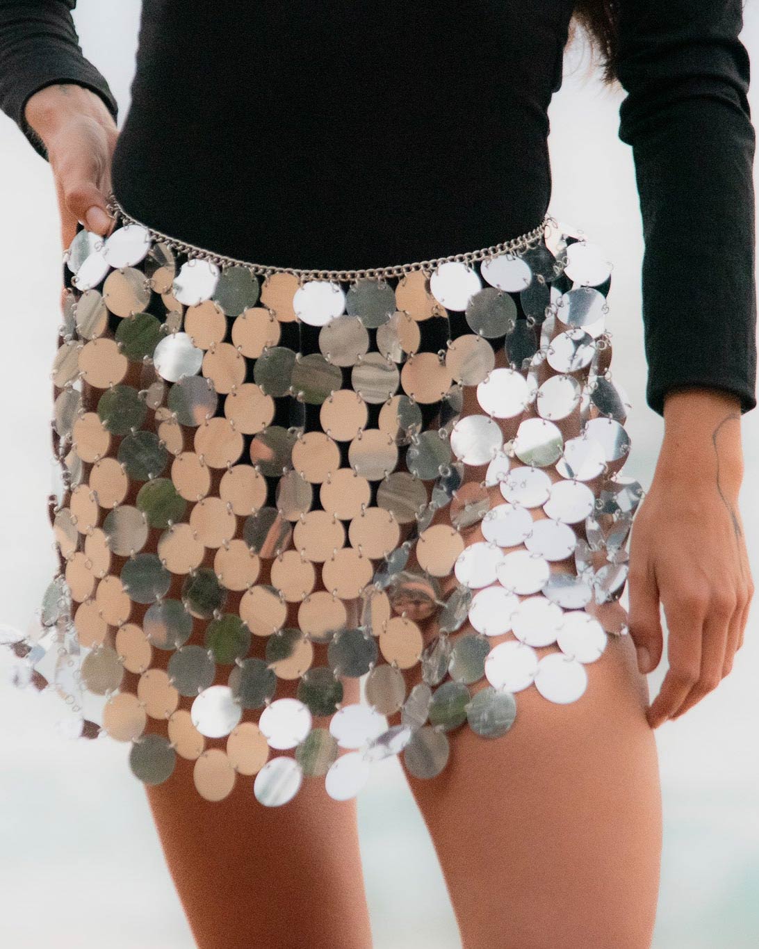 Disc sequin skirt in silver chrome. Party look, festival rave outfit