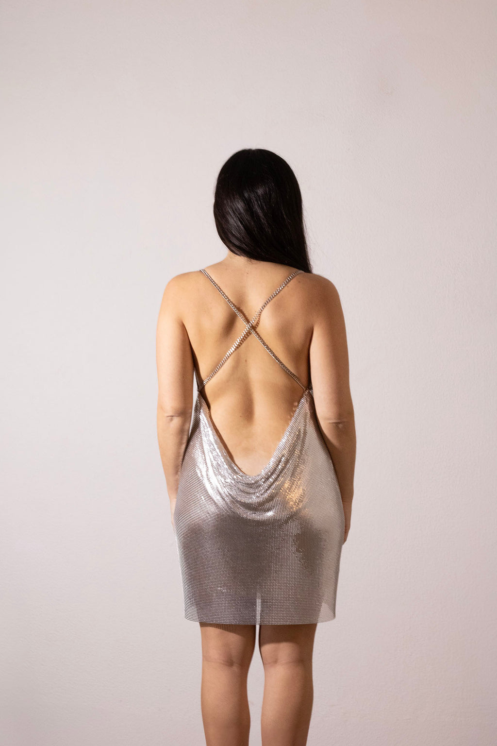 Shiny silver chainmail dress with open crossed chain straps back. Party sequined dress. 