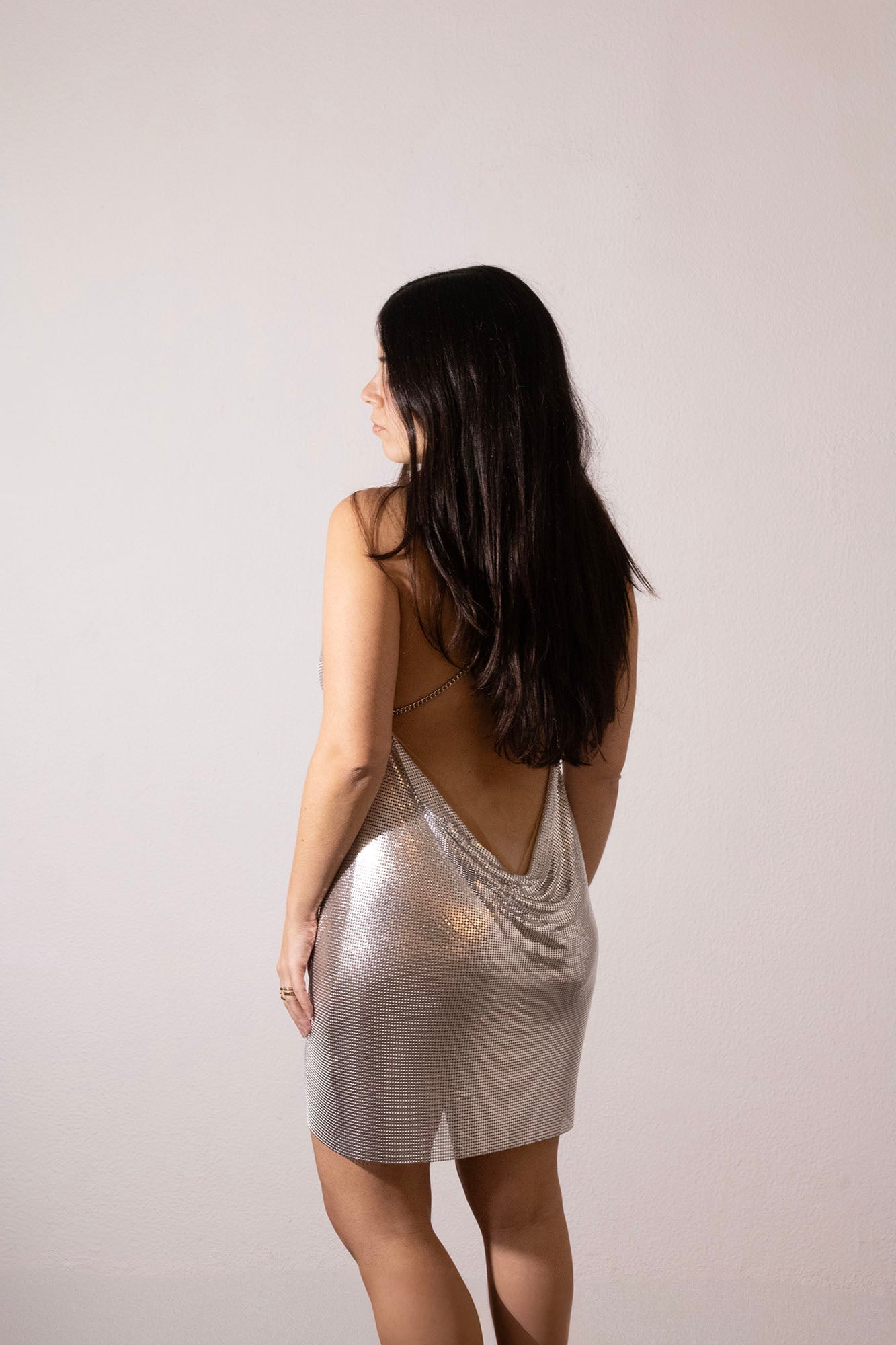 Shiny silver chainmail dress with open crossed chain straps back. Party sequined dress. 